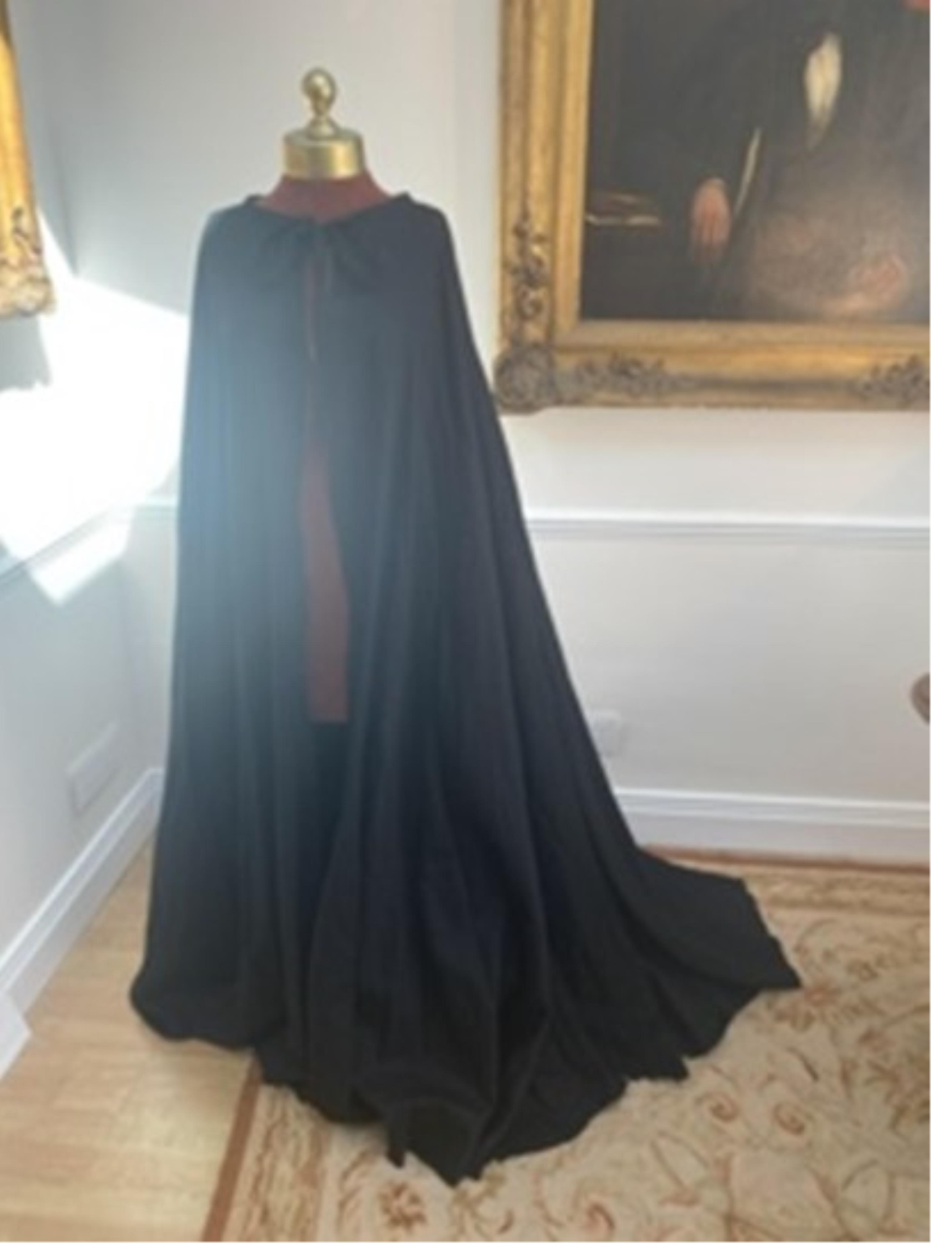 A men’s black heavy cotton cloak – with label Royal Opera House ‘Tannhauser’ – pilgrim character